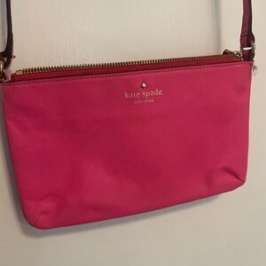 Hot pink Kate Spade crossbody purse.